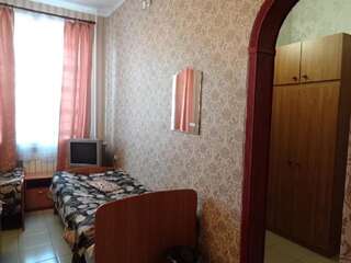 Гостиница Лотос Иркутск Односпальная кровать в общем номере с 4 кроватями-9